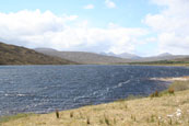 Loch a Chroisg near Achnasheen, Wester Ross, Scotland, with the Torridon Mountain Range in the background