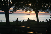 The sun setting on the Pacific Ocean at English Bay, Vancouver, British Columbia, Vancouver