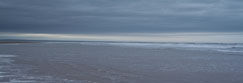 Looking north over St Andrews Bay towards the Firth of Tay from Kinshaldy Beach beside Tentsmuir Forest, near Leuchars, Fife, Scotland