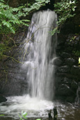 A cascade of water at the Old Weir on the burn Rossie near to Inchture, Perthshire, Scotland