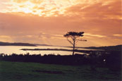 The sun stting over Loch Ewe at Aultbea, Wester Ross, Scotland