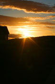 Sunset over the village of Badachro, Wester Ross, Scotland