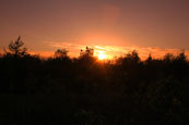 The sun setting from the viewpoint on the Western Edge at Perth, Perthshire, Scotland